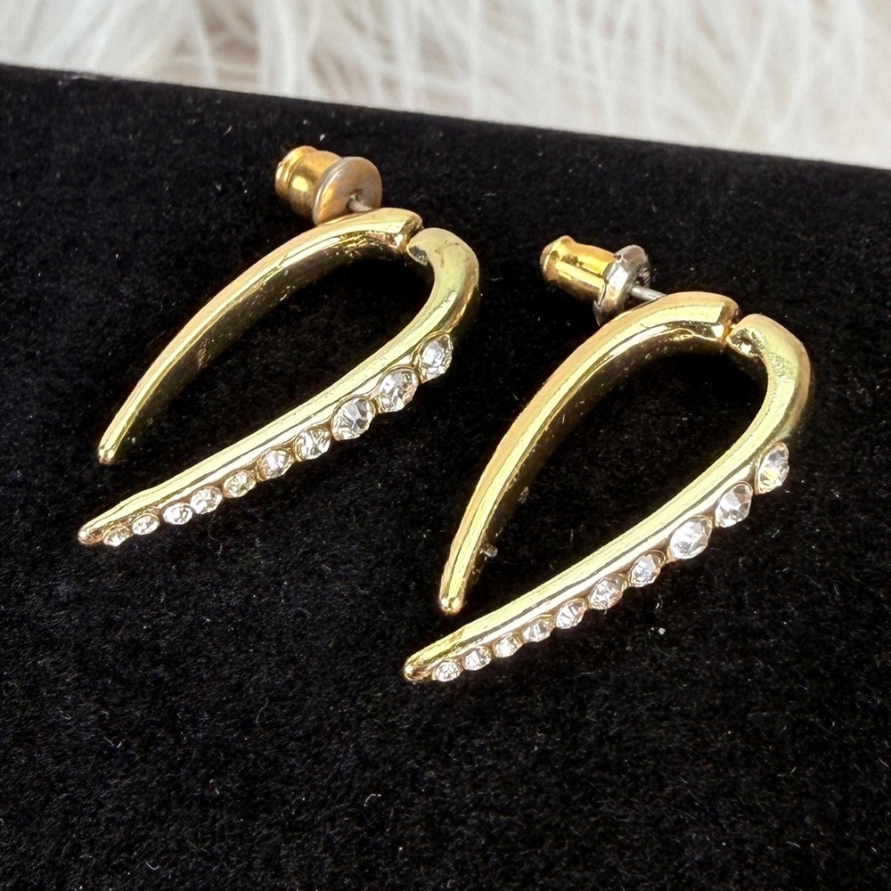 Vintage goldtone crystal clear bling curved post pierced earrings.